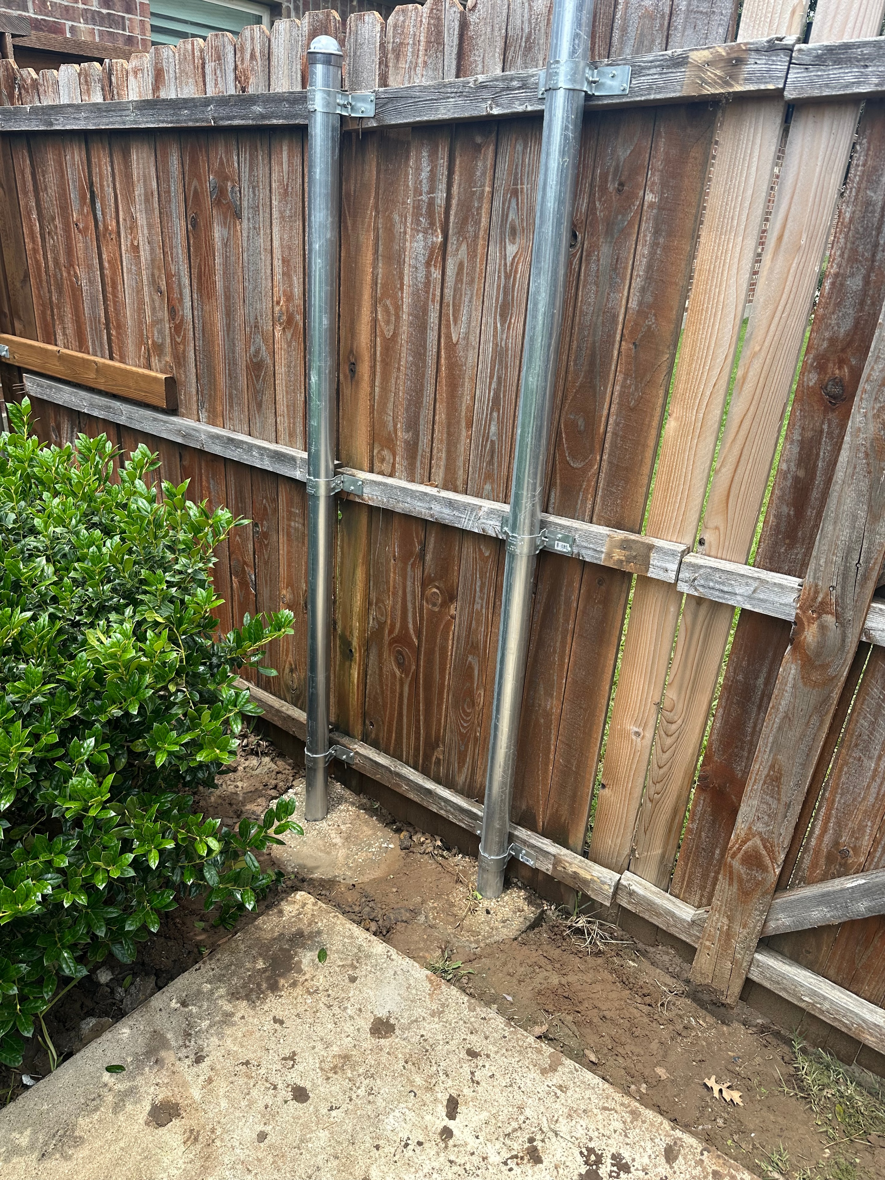 Fence repair with steel post reinforcement
