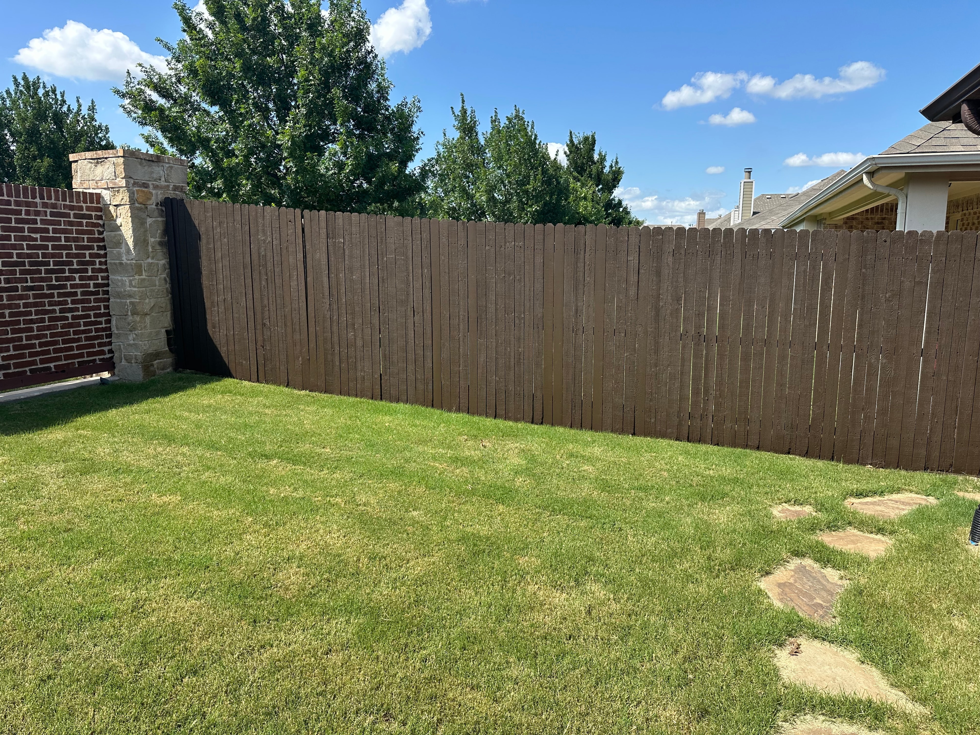 Completed brown fence staining