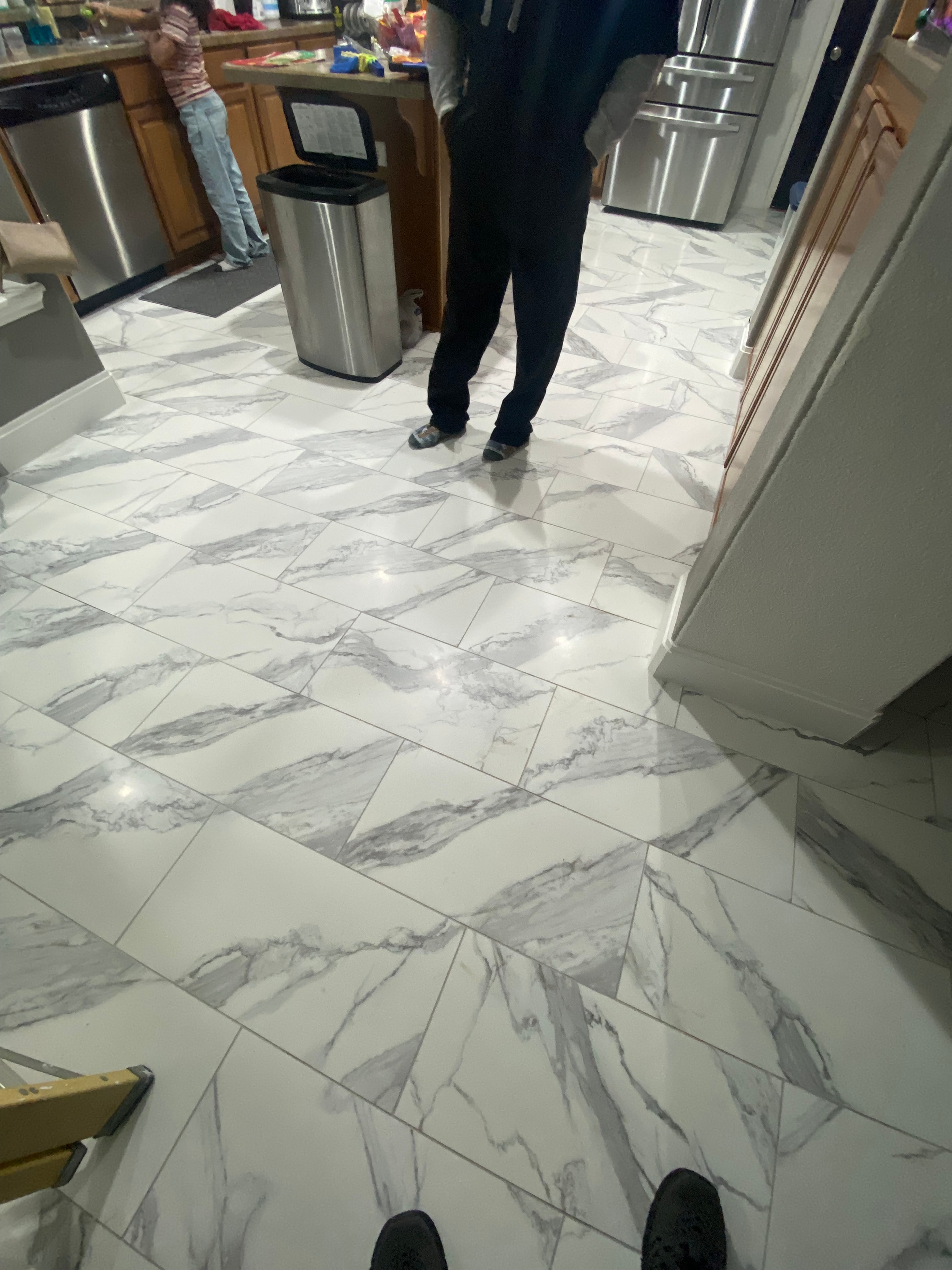 Marble porcelain tile flooring completed — kitchen North Texas