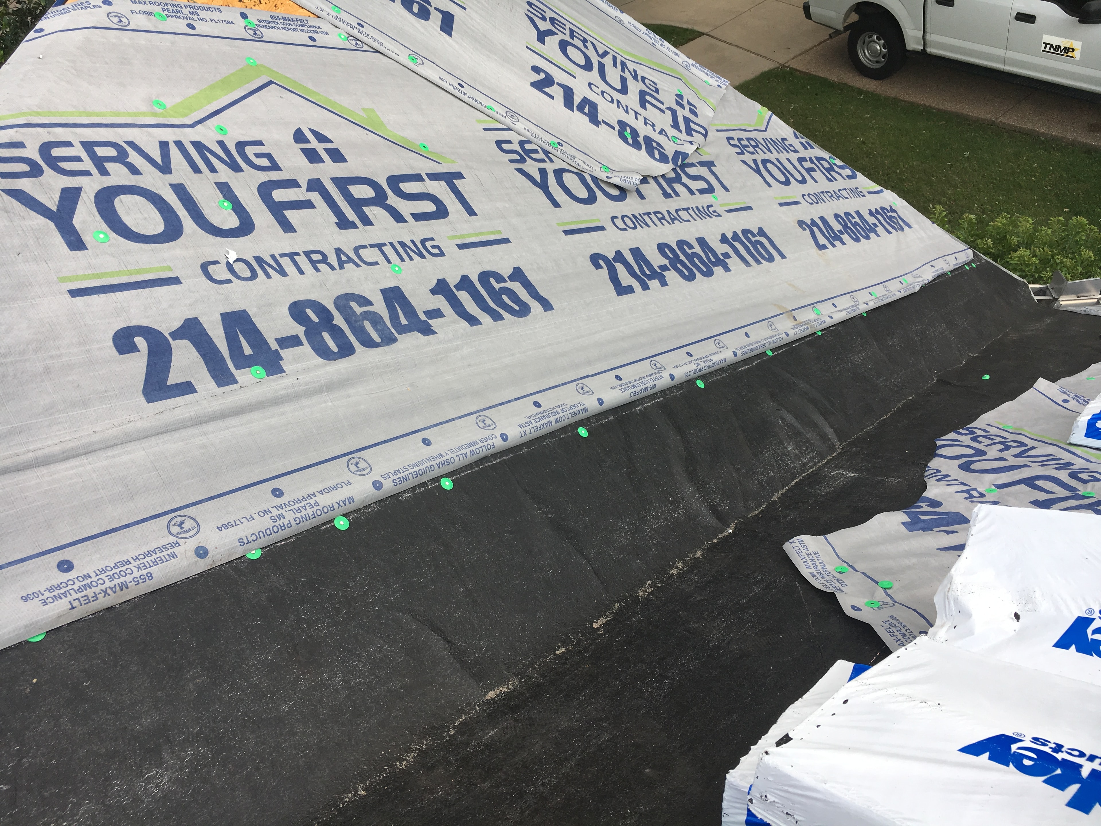 Serving You First Contracting branded roofing underlayment installation
